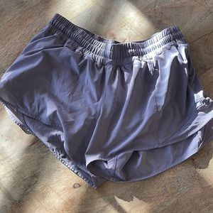 Tall, light purple, lululemon size 12, lines running shorts.
